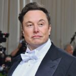 (FILES) In this file photo taken on May 02, 2022, Elon Musk arrives for the 2022 Met Gala at the Metropolitan Museum of Art in New York. - Elon Musk on May 10, 2022, said he would lift Twitter's ban on former US president Donald Trump if Musk's deal to buy the global messaging platform is successful. "I would reverse the ban," the billionaire said at a Financial Times conference, noting that he doesn't own Twitter yet, so "this is not like a thing that will definitely happen." (Photo by Angela Weiss / AFP) (Photo by ANGELA WEISS/AFP via Getty Images)