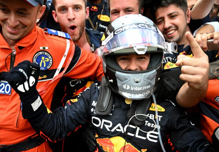 FILE PHOTO: Formula One F1 - Monaco Grand Prix - Circuit de Monaco, Monte Carlo, Monaco - May 29, 2022 Red Bull's Sergio Perez celebrates with teammates after winning the race Pool via REUTERS/Christian Bruna