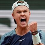 Denmark's Holger Rune upset Stefanos Tsitsipas to reach the French Open quarter-finals