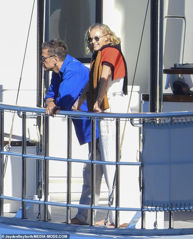 Lifestyles of the rich and famous! Lachlan Murdoch and wife Sarah looked as happier as ever as they cruised around Sydney Harbour in their new $30million superyacht on Friday