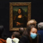 Man arrested after smearing Mona Lisa with cake at Louvre