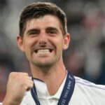 Real Madrid's goalkeeper Thibaut Courtois celebrates after winning the Champions League final