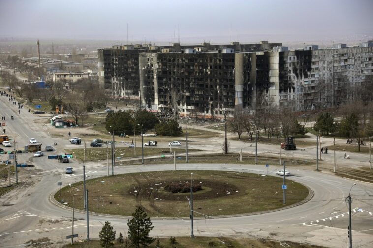 Workers in Mariupol, Ukraine unearth more horrors