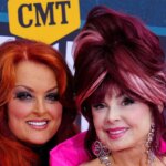 Wynonna Judd Vows She'll "Continue to Sing" as She Releases New Song After Mom Naomi’s Death - E! Online