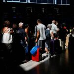 Passengers queue at check-in desks at Malaga-Costa del Sol Airport, in Malaga, Spain June 4, 2022. REUTERS/Jon Nazca