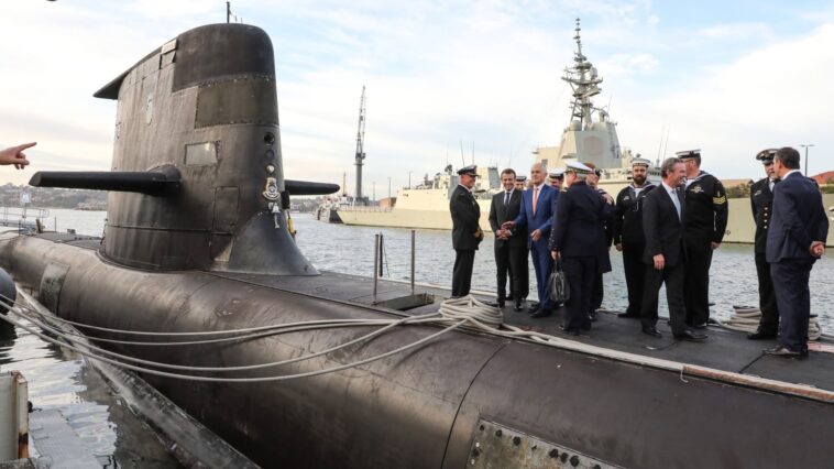 Australia reaches settlement with France over scrapped submarine deal