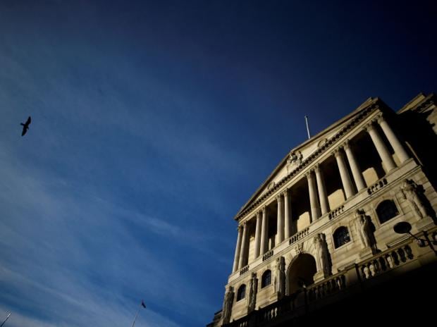 A bird flies past The Bank of England in the City of London (Photo: Reuters)