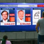 Colombian presidential election results shown on a TV screen