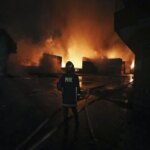 Firefighters work to contain a fire that broke out at the BM Inland Container Depot, a Dutch-Bangladesh joint venture, in Chittagong. (AP Photo)