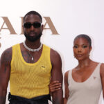 Gabrielle Union and Dwyane Wade Amp Up Couples’ Styling in Tank Top Pieces at Prada’s Menswear Milan Fashion Week Spring 2023 Show