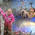 Picture of a child at Glastonbury and pictures of the crowds