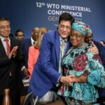 WTO Chief Ngozi Okonjo-Iweala is congratulated by Commerce Minister Piyush Goyal after a closing session of the Ministerial Conference at the WTO headquarters in Geneva June 17, 2022. (Reuters)