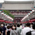 Japan eases foreign tourism ban, allows guided package tour