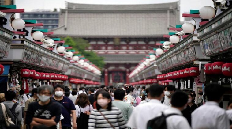 Japan eases foreign tourism ban, allows guided package tour