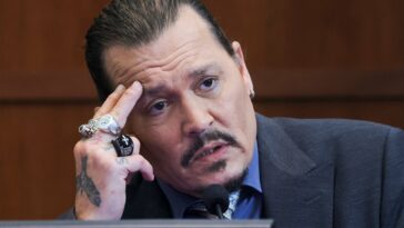 Johnny Depp Seen In Court Wearing Daughter's Bracelete