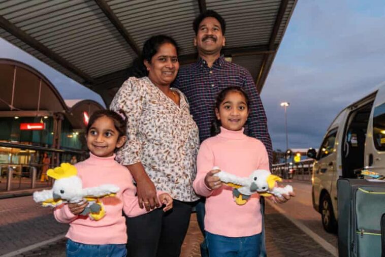 Priya and Nade Nadesalingam and their daughters Kopika and Tharnicaa, are seen at Perth Airport.