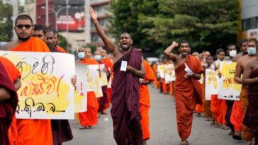 Photos: Sri Lanka students march to demand president, PM resign