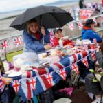 People picnic in Morecambe, Lancashire, as the council attempts to break its record for longest street party, which it set in the 2012 diamond jubilee.