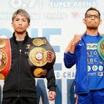 IBF and WBA bantamweight boxing champion Naoya Inoue of Japan (L) and WBC champion Nonito Donaire of Philippines (R) pose during a press event in Yokohama, Kanagawa prefecture on June 3, 2022. - Donaire said on June 3, 2022 there was "a fire burning inside" him as he prepares to face Naoya Inoue next week in a hotly anticipated sequel to their 2019 boxing classic. (Photo by JAPAN POOL / JIJI PRESS / AFP) / Japan OUT