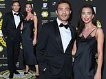 Amy Jackson turns heads in a slinky black dress as she joins boyfriend Ed Westwick at film awards