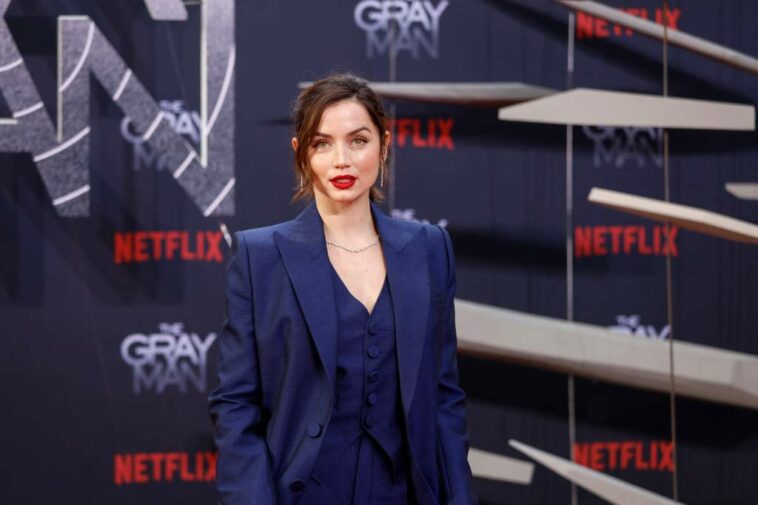 Ana de Armas Suits Up in Menswear-inspired Louis Vuitton Outfit for ‘The Gray Man’ Berlin Premiere