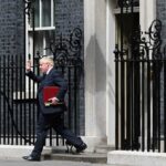 Boris Johnson Vows to Go On Amid Wave of Cabinet Resignations