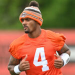 Browns QB Deshaun Watson reports to training camp amid uncertainty