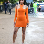 Alessandro Vigilante orange cutout dress and tom ford white padlock sandals with gold stiletto heels, Celebrities seen attending the Serpentine Summer Evening event in London. 30 Jun 2022 Pictured: Ciara. Photo credit: MEGA TheMegaAgency.com +1 888 505 6342 (Mega Agency TagID: MEGA873777_003.jpg) [Photo via Mega Agency]