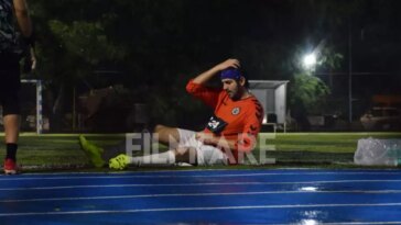 Kartik Aaryan photographed playing football in Mumbai rains