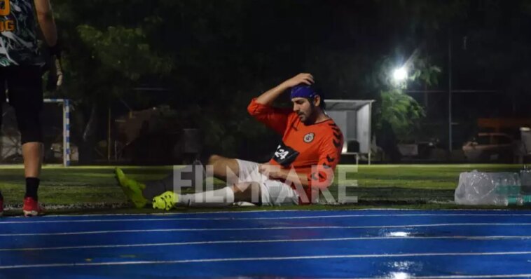 Kartik Aaryan photographed playing football in Mumbai rains