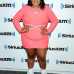 Lizzo Wears Coral Cutout Yitty Dress and Talks New ‘Special’ Album in SiriusXM Interview