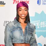 Lori Harvey Discusses Wealth & Power in Cropped Saint Laurent Jacket With Tom Ford Crocodile Leather Heels at Essence Festival