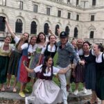 You CAN always get what you want! Mick Jagger continued to be a hit with the ladies as he posed with dirndl-clad females while taking in the sights of Vienna with Melanie Hamrick