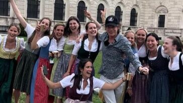 You CAN always get what you want! Mick Jagger continued to be a hit with the ladies as he posed with dirndl-clad females while taking in the sights of Vienna with Melanie Hamrick