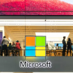 Microsoft reports earnings that fall short of already-reduced expectations.