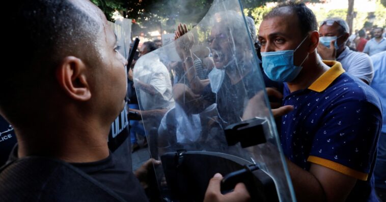 Police arrest leading gay activist in crackdown on Tunisia rally