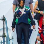 Glowing: Rihanna looked incredible as she made a rare appearance to support boyfriend ASAP Rocky at his concert during the Lollapalooza festival on Sunday in Paris, France