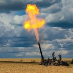 Russian soldiers fire a 2S4 Tyulpan self-propelled heavy mortar from their position at an undisclosed location in Ukraine today