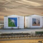 Storage tanks stand at an oil processing facility in Saudi Aramco's Shaybah oilfield in the Rub' Al-Khali (Empty Quarter) desert in Shaybah, Saudi Arabia, on Tuesday, Oct. 2, 2018. Saudi Aramco aims to become a global refiner and chemical maker, seeking to profit from parts of the oil industry where demand is growing the fastest while also underpinning the kingdoms economic diversification. Photographer: Simon Dawson/Bloomberg via Getty Images