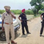 Punjab Police personnel during an encounter with gangsters suspected to be involved in the Sidhu Moosewala murder case near Attari in Amritsar