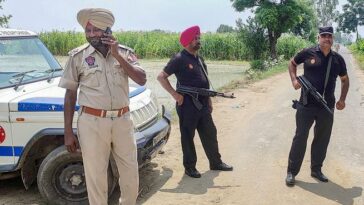 Punjab Police personnel during an encounter with gangsters suspected to be involved in the Sidhu Moosewala murder case near Attari in Amritsar