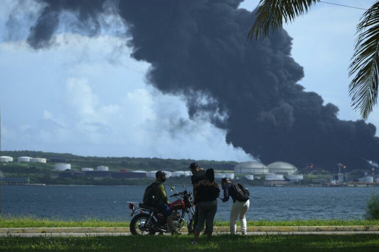 17 missing, dozens hurt as fire rages in Cuban oil tank farm