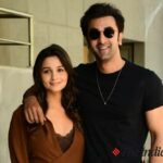 Alia Bhatt looks lovely in brown wraparound dress; Ranbir Kapoor keeps it dapper in all-black look