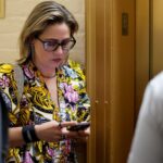 How Wall Street wooed Sen. Kyrsten Sinema and preserved its multi-billion dollar carried interest tax break