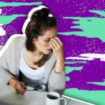 woman looking stressed and exhausted at her desk