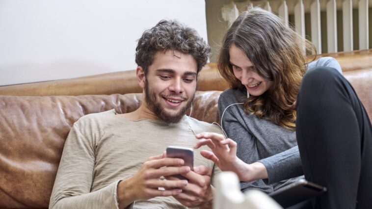 How to connect two AirPods to one iPhone so you can watch a movie on the same device as a friend