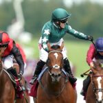 Hollie Doyle punches the air as Nashwa wins the Nassau Stakes at Goodwood