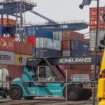 The Dutch port has faced an onslaught of both goods and empty boxes offloaded from other European maritime operations, shipping experts said. (Photo: Bloomberg)