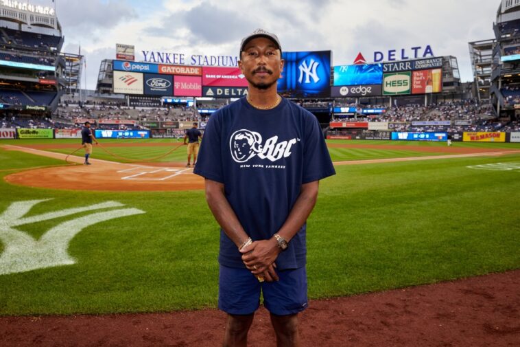 Pharrell Williams Throws Ceremonial First Pitch at Yankees vs. Mets Game