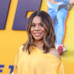 Regina Hall Dazzles in Yellow Silk Top and Feathered Aliétte Skirt at ‘Me Time’ Premiere